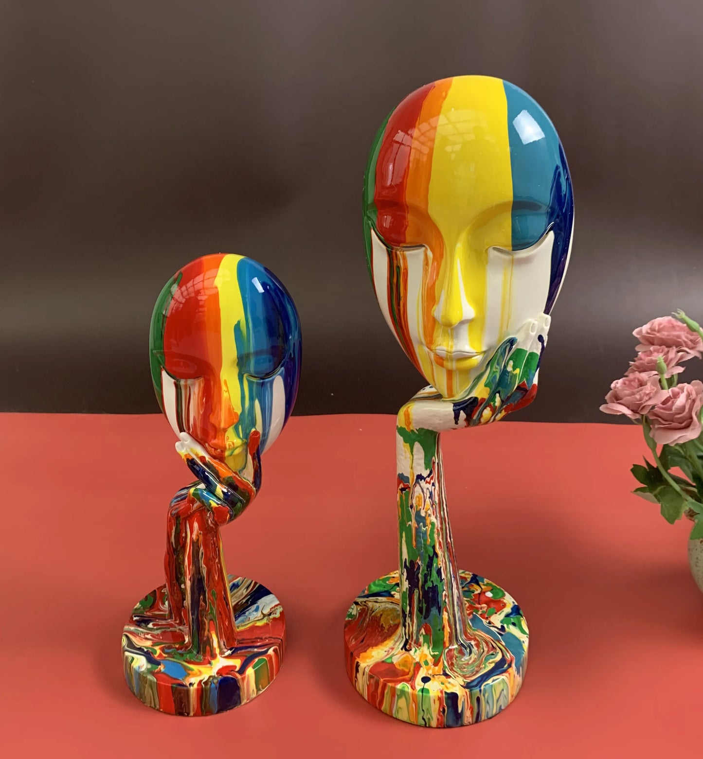 Painted Colorful Woman Face Statues